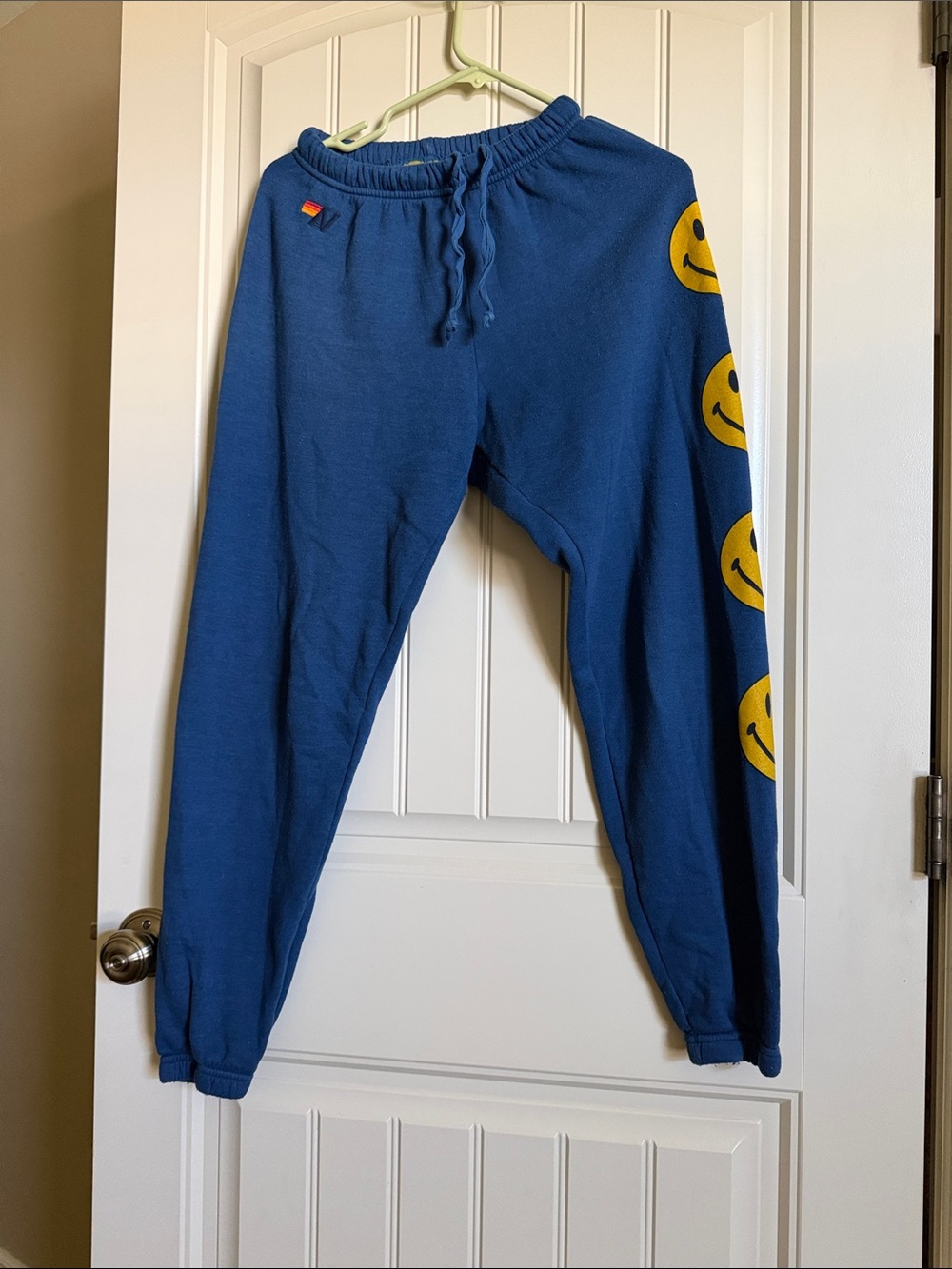 Aviator Nation Blue Sweatpants with Yellow Smile Graphics